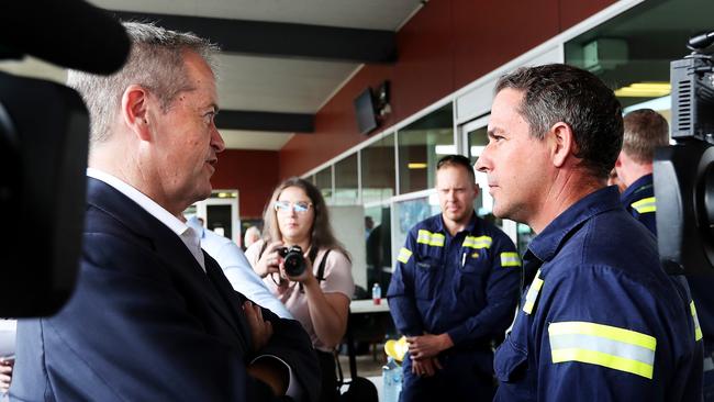 The Gladstone Ports worker talks to Bill Shorten about tax cuts. Picture: Kym Smith.