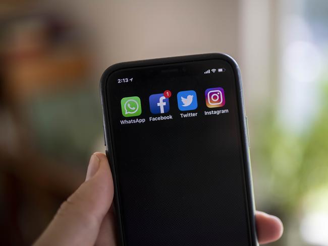 A smart phone is seen displaying a social media app in Brisbane, Saturday, April 14, 2018. (AAP Image/Glenn Hunt) NO ARCHIVING