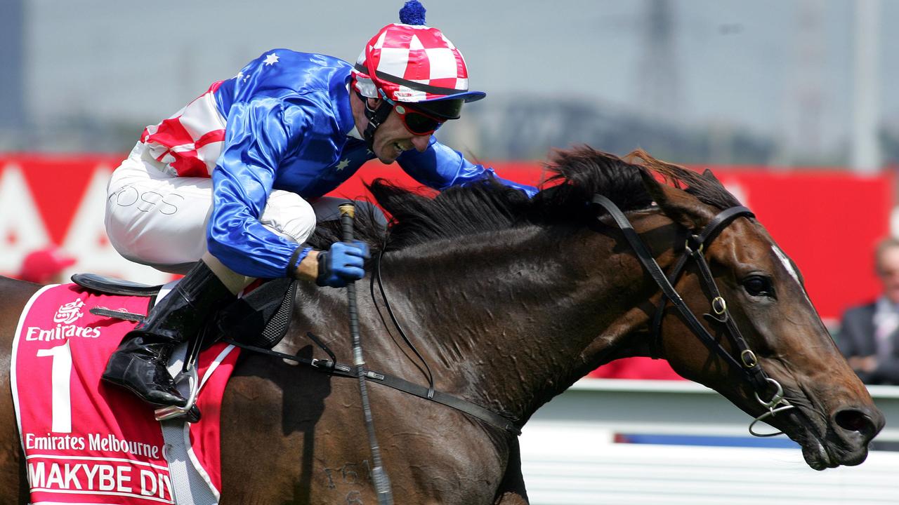 02 Nov 2004 Flemington Race 7 jockey Glen Boss wins the Melbourne Cup on Makybe Diva. sport horseracing action weather rainfall Vic