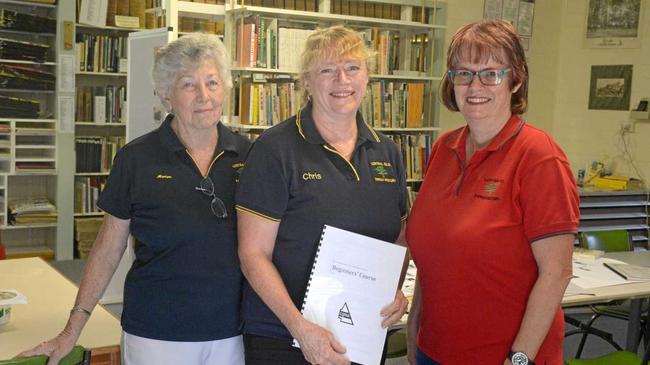 HISTORY BUFFS: Marion Hall, Chris Wright and Linda Marshall at the CQ Family History Association Hall. Picture: Jann Houley