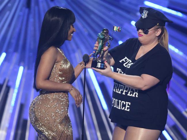 Hand over ... Rebel Wilson presents the award to Nicki Minaj. Picture: AP