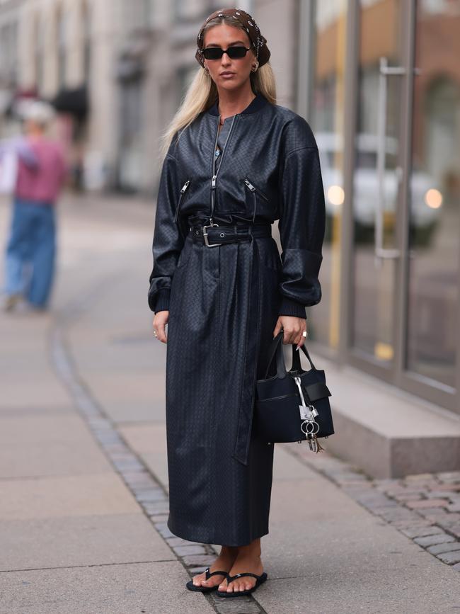 Fashion influencer Emili Sindlev wears Chanel flip flops at Copenhagen Fashion Week in August. Picture: Getty Images