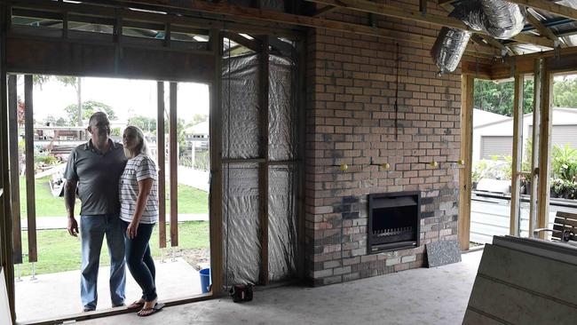Michelle Holmes and David McInnes at their home Burpengary East, where building extension only half built. Picture: Patrick Woods.
