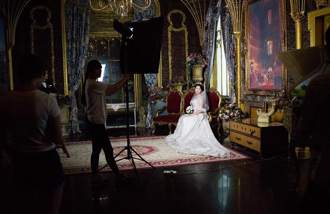 The Inside Only Photo Studio on the outskirts of Shanghai. It houses three floors of sets for wedding photos, including rooms and rooms of dresses and suits in every style imaginable.