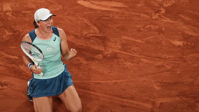 Iga Swiatek celebrates after winning match point against Coco Gauff. Picture: Getty