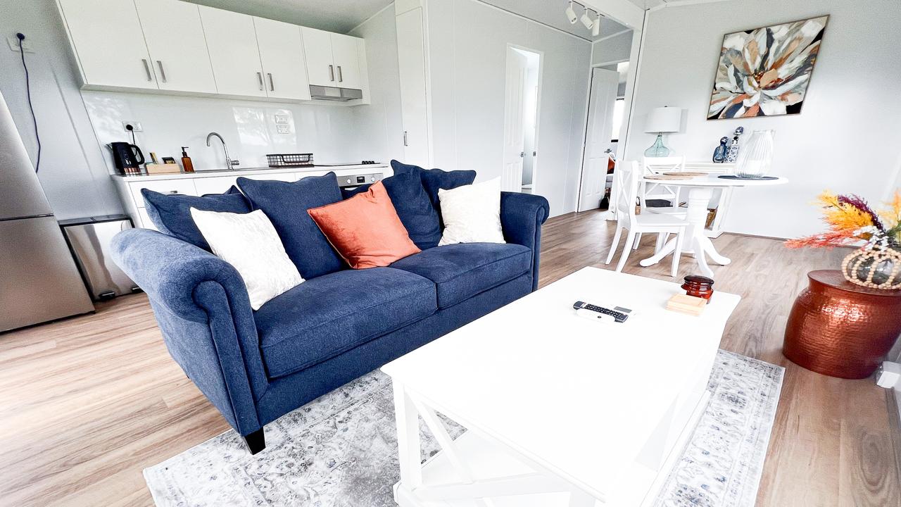 The living and kitchen inside a relocatable VanHome.