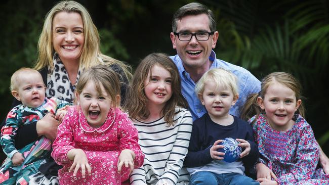 NSW Treasurer Dominic Perrottet at home last year with his wife Helen and children, baby Harriet, Annabelle, 4, Charlotte, 8, William, 2, and Amelia, 6. Picture: Jenny Evans