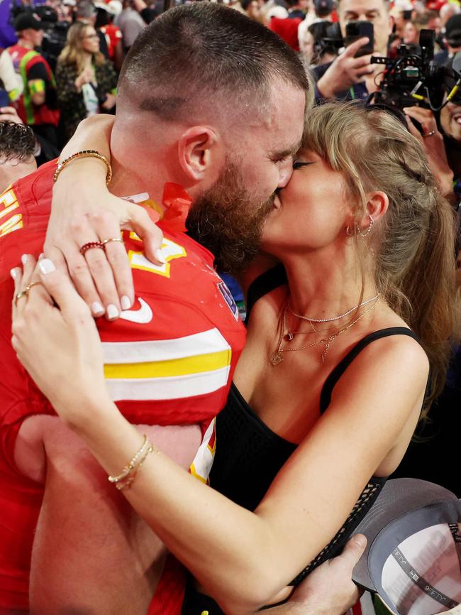 Sharing a smooch after the Super Bowl. Ezra Shaw/Getty Images/AFP