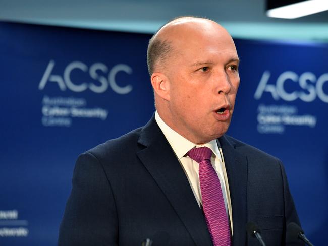 Minister for Home Affairs Peter Dutton at the opening of the Australian Cyber Security Centre at the Brindabella Business Park in Canberra, Thursday, August 16, 2018. (AAP Image/Mick Tsikas) NO ARCHIVING