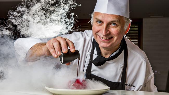 The Star's Cucina Vivo restaurant head pastry chef Herbert Tossman adding the final touches to the Cioccolato Rosso Ferrari. Picture: Jerad Williams. Picture: Jerad Williams