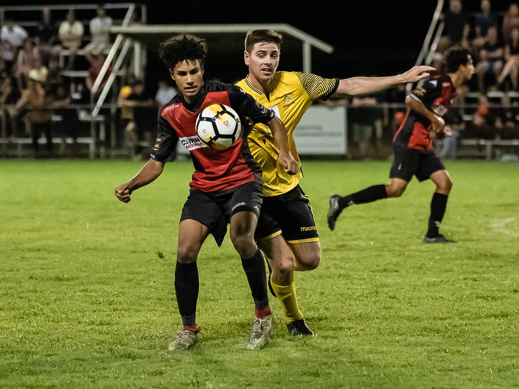 Leichhardt's Seamus Fowler and Edge Hill United's Joshua Taylor in Saturdays FNQ Premier League grand final between Edge Hill United and Leichhardt at Endeavour Park. Picture: Emily Barker