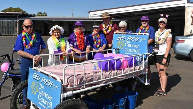 RAISING FUNDS: Wal Barton, Ann Muller, Penny Thompson, Sam Crenerry, Don Lee, Meg Doyle, Greg Mackay and Helen Wanka at the 2019 Cancer Council Bed Push fundraiser in Dalby. Picture: Shannon Hardy