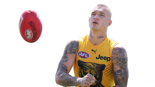 GOLD COAST, AUSTRALIA - JANUARY 30: Dustin Martin handballs during a Richmond Tigers AFL training session at Southport Sharks on January 30, 2020 in Gold Coast, Australia. (Photo by Chris Hyde/Getty Images)