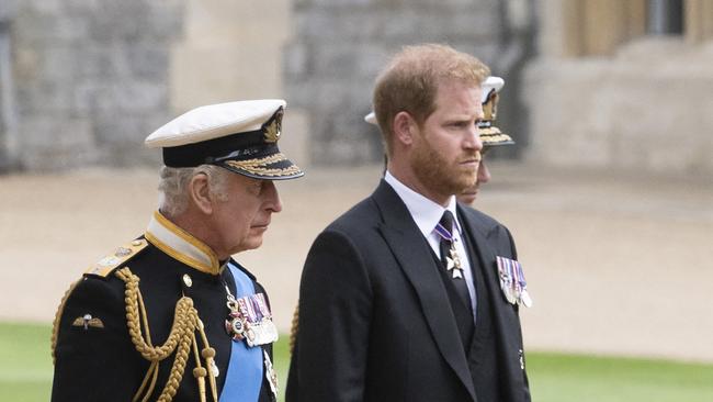 King Charles III walks with Prince Harry as they arrive at St George's Chapel inside Windsor Castle in September 2022 ahead of the Committal Service for Queen Elizabeth II. Picture: AFP