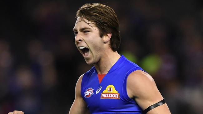 Debutant Rhylee West celebrates a goal during the Bulldogs’ victory. Picture: AAP Image/Julian Smith.