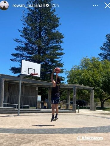 St Kilda's Rowan Marshall and Carlton's Blake Acres playing basketball.