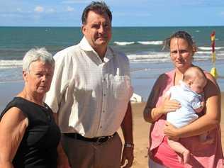 SAFETY BARRIERS: Cheryl Hay, Member for Burnett Stephen Bennett and Alicia Bauer (with her son Evan Bauer) are calling for safer swimming areas at Moore Park Beach. Picture: Contributed