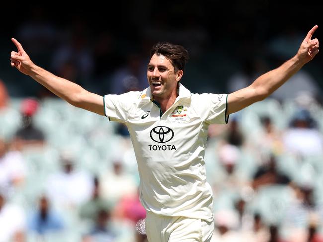 ADELAIDE, AUSTRALIA - DECEMBER 08: Pat Cummins of Australia celebrates the wicket of RAduring day three of the Men's Test Match series between Australia and India at Adelaide Oval on December 08, 2024 in Adelaide, Australia. (Photo by Paul Kane/Getty Images)