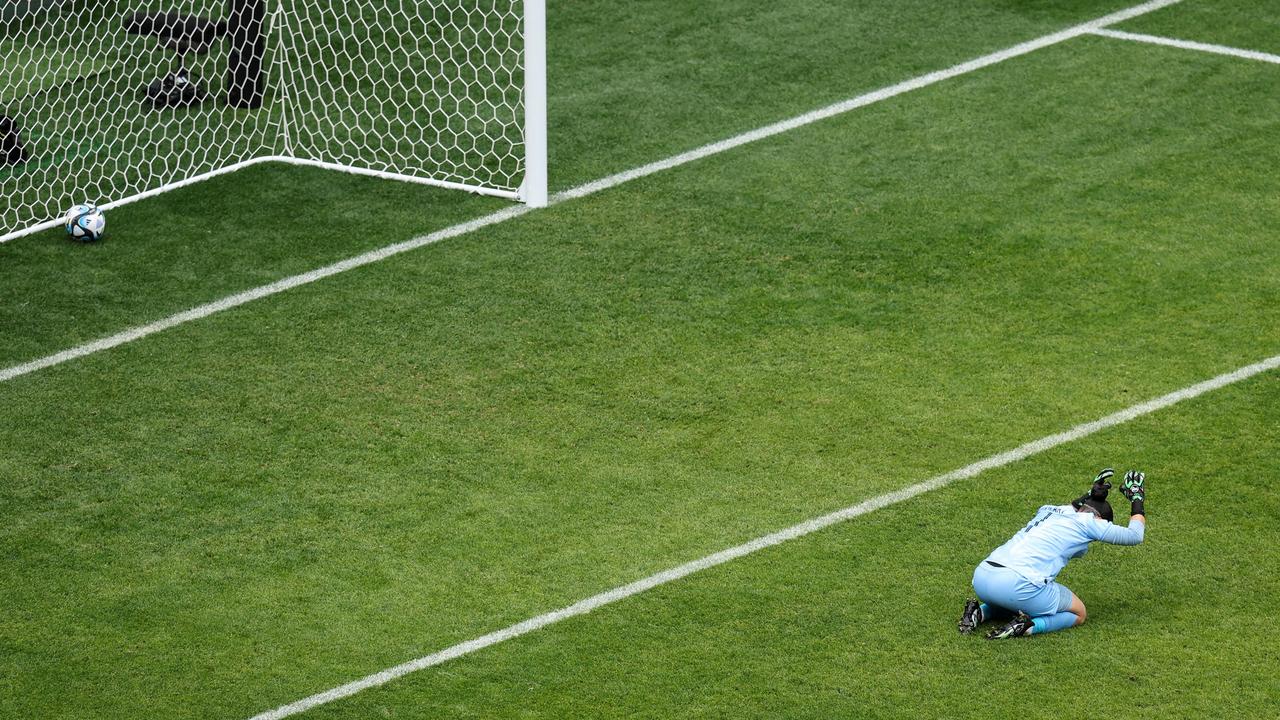 South Africa goalkeeper Kaylin Swart hits the ground in frustration after fumbling the ball for the second Netherlands goal. Picture: Charlotte Wilson/Getty Images