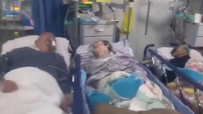 Disturbing video has emerged showing a hospital ward and room inundated with Covid-19 patients in China. Picture: Twitter