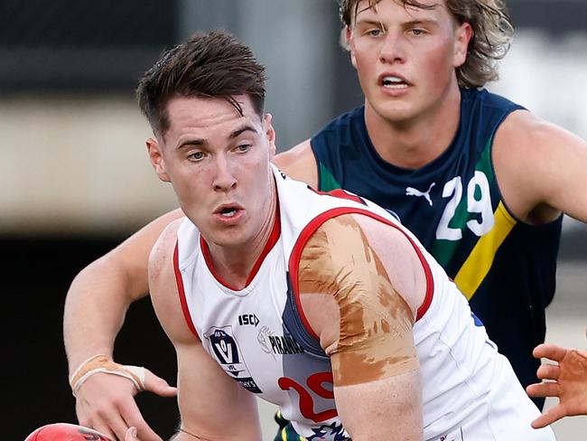 MELBOURNE, AUSTRALIA - APRIL 13: Cooper Keogh of the Coburg Lions in action during the 2024 AFL Academy match between the Marsh AFL National Academy Boys and Coburg Lions at Ikon Park on April 13, 2024 in Melbourne, Australia. (Photo by Michael Willson/AFL Photos via Getty Images)
