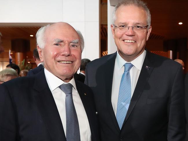 Former Prime Minister John Howard, Prime Minister Scott Morrison and Former Prime Minister Tony Abbott pose for photographs during an afternoon tea at the official opening of the 46th Federal Parliament,  at Parliament House in Canberra. Picture Kym Smith