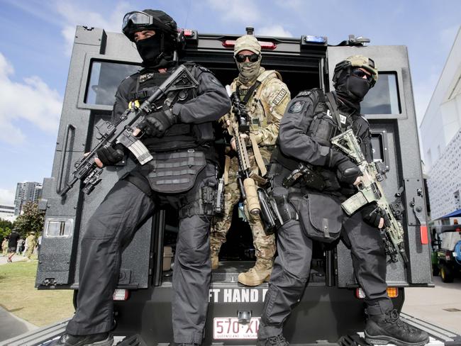 Security personnel are seen during the Queensland Police Service and The Australian Defence Force joint display of some of the security measures that will be implemented during the 2018 Commonwealth Games. Picture: Tim Marsden