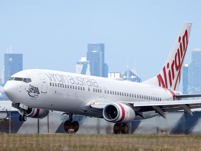 A Virgin plane lands at Tullamarine Airport, Melbourne. Picture: Mark Stewart