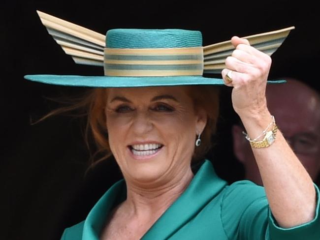 WINDSOR, ENGLAND - OCTOBER 12: Sarah, Duchess of York arrives for the wedding of Princess Eugenie to Jack Brooksbank at St George's Chapel in Windsor Castle on October 12, 2018 in Windsor, England. (Photo by  Jeremy Selwyn - WPA Pool/Getty Images)