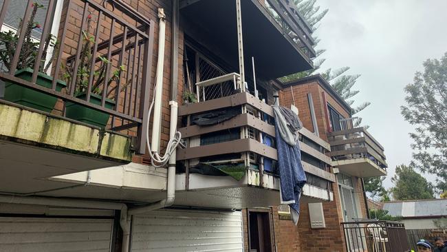 A woman has escaped a burning unit in Punchbowl by jumping off this balcony, breaking her leg in the process. July 14, 2022. Picture: Fire and Rescue NSW