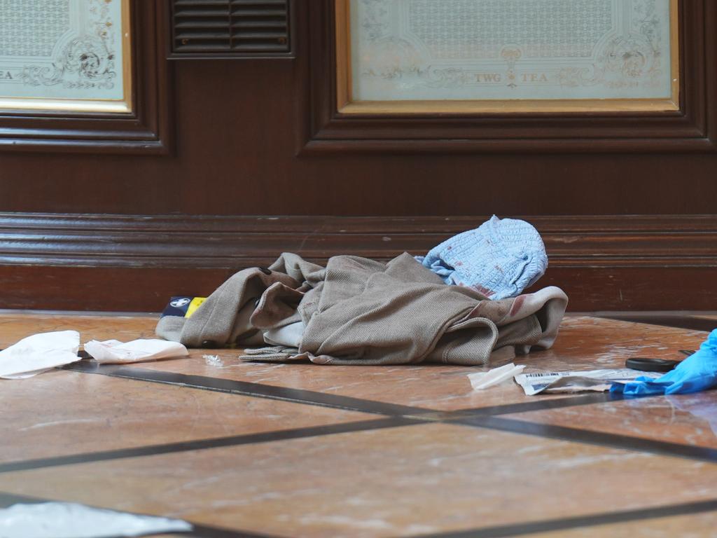 Discarded clothing and emergency medical equipment at the scene after the stabbing. Picture: Getty Images