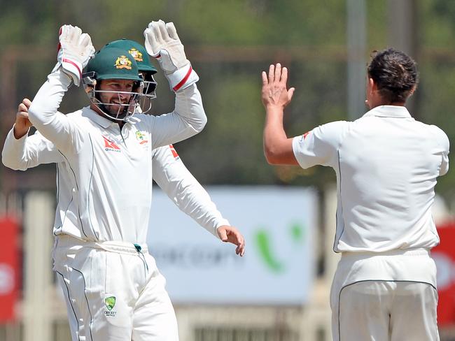 Stephen O’Keefe (right) started well on the tour of India but his form fell away. Picture: AFP