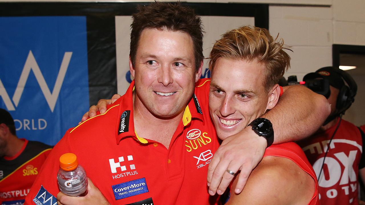 Stuart Dew celebrates with Darcy Macpherson. Photo: Michael Dodge/Getty Images. 