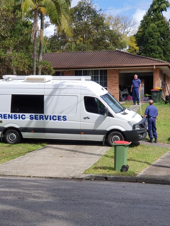 Forensic investigators arrive at the Narara home where Ms Easey was allegedly killed. Picture: Fiona Killman