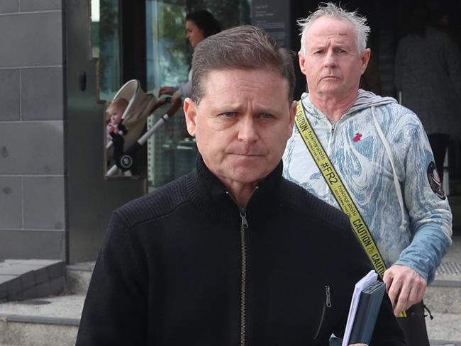 Jockey Danny Nikolic leaves the Broadmeadows Magistrate court along with his lawyer Pat Lennon in July 2024. Picture: David Crosling