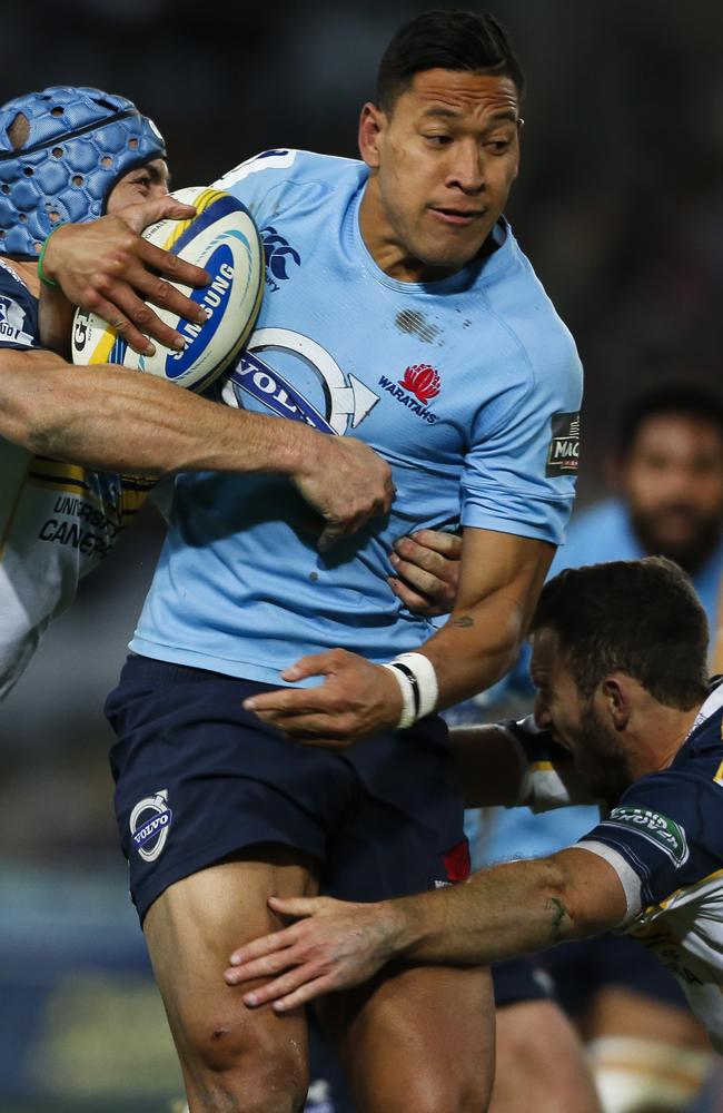 Israel Folau takes on the Brumbies defence.