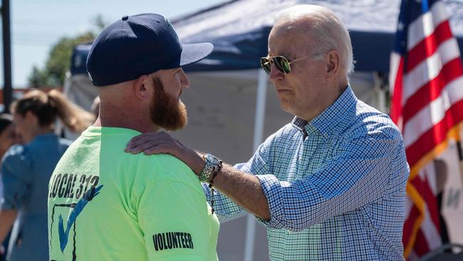 US President Joe Biden speaks with a union worker in, Delaware yesterday. Picture: AFP