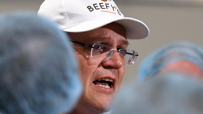 Australian Prime Minister Scott Morrison at a pie factory on the Sunshine Coast yesterday. Picture: Dan Peled/AAP