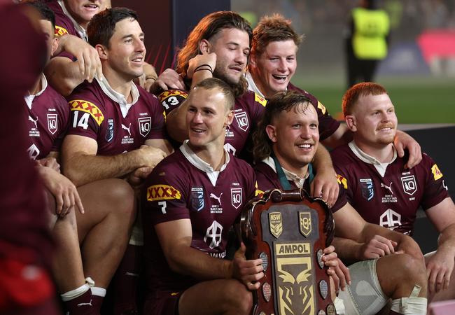 Daly Cherry-Evans and the Maroons celebrate with the shield. Picture: Getty