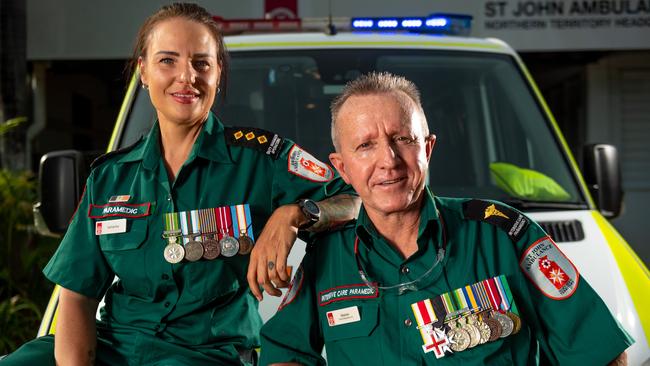 St John paramedics Samantha Cooper and Warren Purse have previously served with the ADF but are currently frontline workers in the battle against a new enemy. They say they will still make time to honour Anzac Day this year. Picture: Che Chorley