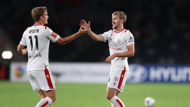 Adelaide United’s Ben Halloran (R) celebrates scoring a goal with Kristian Opseth in the 2-5 loss to Western Sydney Wanderers at Bankwest Stadium. Picture: Matt King/Getty Images