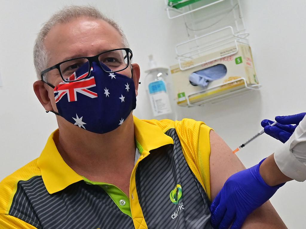 Scott Morrison receives the COVID-19 vaccine on Sunday. Picture: Steven Saphore / AFP