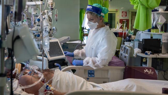 Annalisa Malara with a patient in the COVID-19 Intensive Care Unit of the Ospedale Maggiore di Lodi, in Lodi, near Milan, Italy. Picture: Getty Images