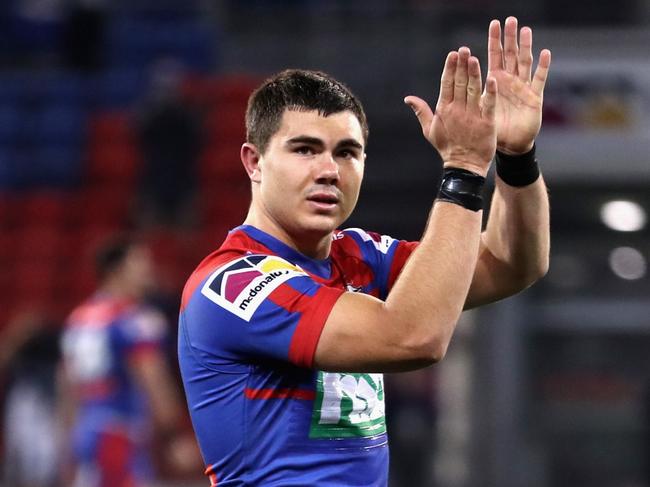 NEWCASTLE, AUSTRALIA - JULY 03: Jake Clifford of the Knights celebrates the win during the round 16 NRL match between the Newcastle Knights and the North Queensland Cowboys at McDonald Jones Stadium, on July 03, 2021, in Newcastle, Australia. (Photo by Ashley Feder/Getty Images)