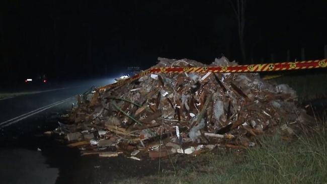 Burning rubbish suspected to be contaminated with asbestos has been found dumped on the side of the road in Sydney’s southwest overnight., , Emergency services were called to Graham Rd in Rossmore shortly before 11pm, where the abandoned building material was found., , Police officers, firefighters and members of Camden Council attended and cleaned up the rubbish.