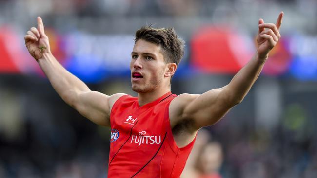 ADELAIDE, AUSTRALIA - MAY 07: Archie Perkins of the Bombers celebrates a goal during the round eight AFL match between Port Adelaide Power and Essendon Bombers at Adelaide Oval, on May 07, 2023, in Adelaide, Australia. (Photo by Mark Brake/Getty Images)