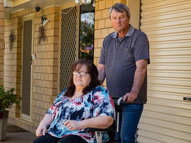 Jennifer Arnold relies on a wheelchair and care from her husband Mark Jenkins after a spine surgeon she claims went wrong in 2018.