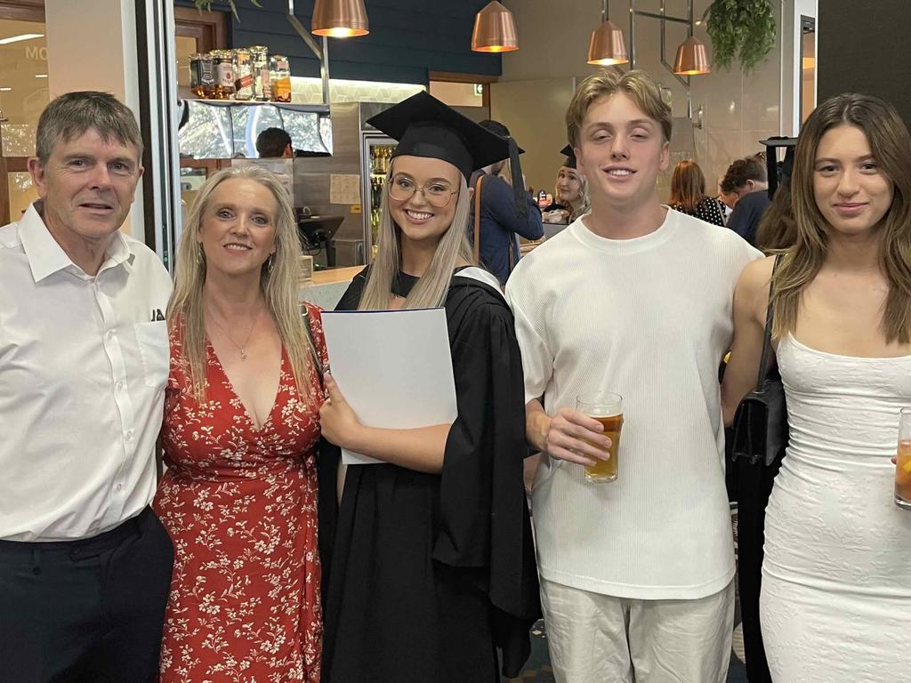 Adina Jones and her family at the University of the Sunshine Coast graduation ceremony at the Beach House Hotel on October 12, 2023.