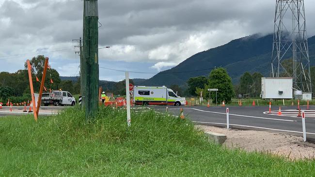 Ambulance leaves the crash scene on the Bruce Highway near Mount Surround. Picture: Satria Dwyer-Darmawan