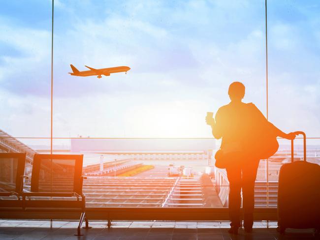 ESCAPE. FLYING HACKS. 23 SEPTEMBER 2018.  happy traveler waiting for the flight in airport, departure terminal, immigration concept Picture: istock